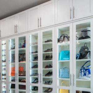 Closet cabinets with glass, storing shoes and accessories