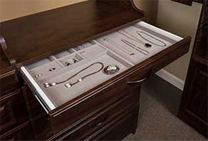 Jewelry tray insert for a custom closet design.
