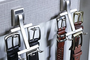 Wall mount belt racks for custom closets systems.