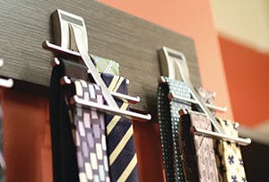 Minimalist silver tie rack for organizing accessories