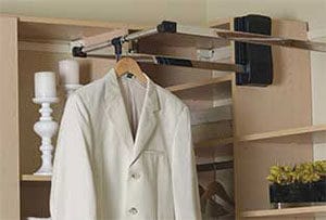 Overhead mounted wardrobe lifts for convenient clothing access while steaming or storing