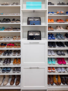 Closet system with tilt out hampers and shoe shelves