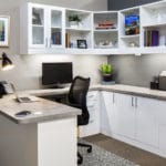 corner desk office with multiple accessories and decor
