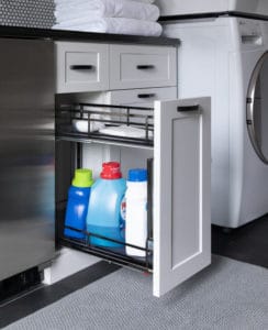 Pull-out cleaning supplies drawer makes it easier to store and access bulky items like laundry detergent 