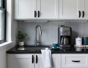 Utility room coffee bar with modern minimalist appliances to make your favor cup of while doing laundry.