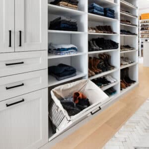 tilt out hamper in custom closet design