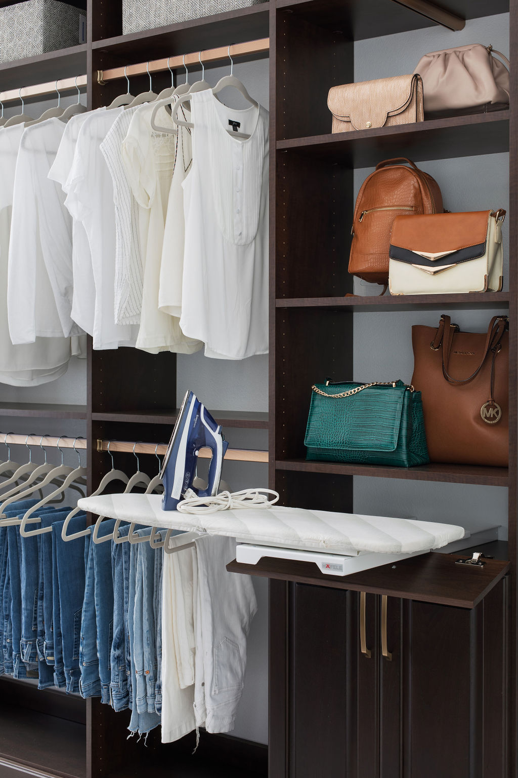 More Space Place custom-closet designers have specific training and experience to design solutions for your space, and they are familiar with what accessories are available to improve function. Iron away storage, wardrobe lifts, hampers, islands and benches are all functional additions to a custom closet. Talk with our closet designers today to learn more about our process.