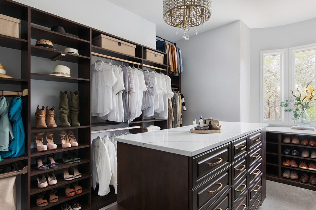 More Space Place custom-closet designers have specific training and experience to design solutions for your space, and they are familiar with what accessories are available to improve function. Iron away storage, wardrobe lifts, hampers, islands and benches are all functional additions to a custom closet. Talk with our closet designers today to learn more about our process.