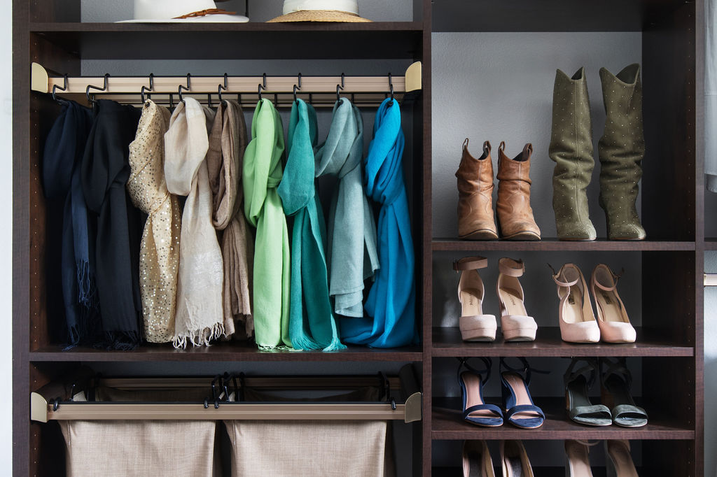 More Space Place custom-closet designers have specific training and experience to design solutions for your space, and they are familiar with what accessories are available to improve function. Iron away storage, wardrobe lifts, hampers, islands and benches are all functional additions to a custom closet. Talk with our closet designers today to learn more about our process.