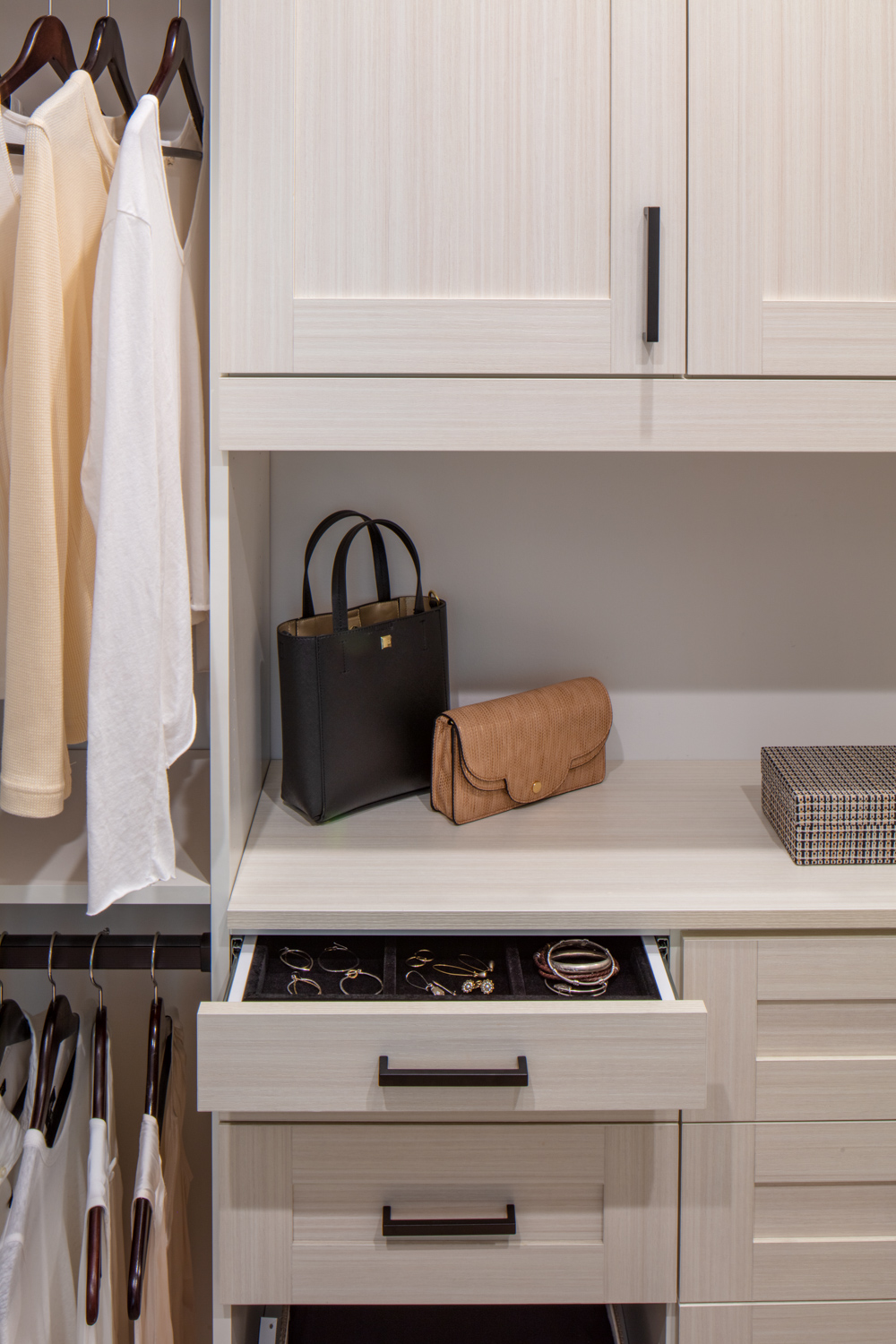 More Space Place custom-closet designers have specific training and experience to design solutions for your space, and they are familiar with what accessories are available to improve function. Iron away storage, wardrobe lifts, hampers, islands and benches are all functional additions to a custom closet. Talk with our closet designers today to learn more about our process.