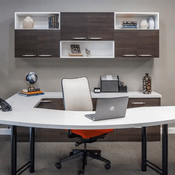 Home office in a combination of white and carbone cross grain doors and curved desk.