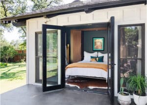 Outside guest home with french doors and a murphy bed