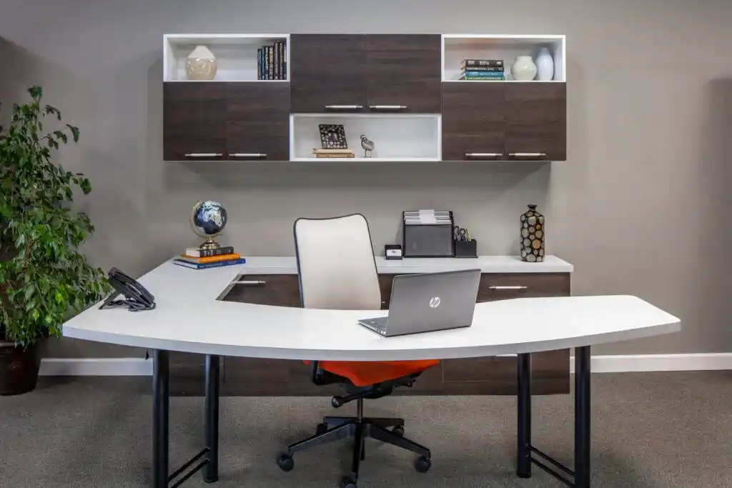 Home office in a combination of white and carbone cross grain doors and curved desk.