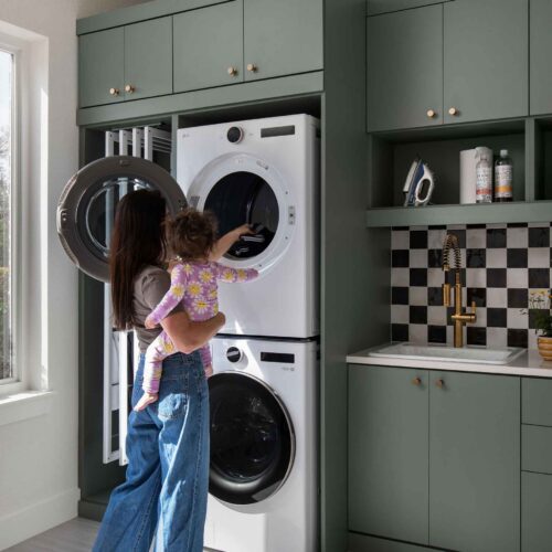 Checkered back splash laundry room | More Space Place Austin